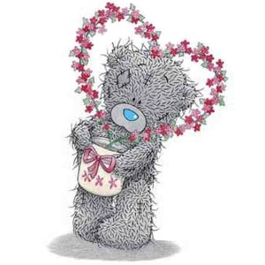 Tatty Teddy with heartshaped flower